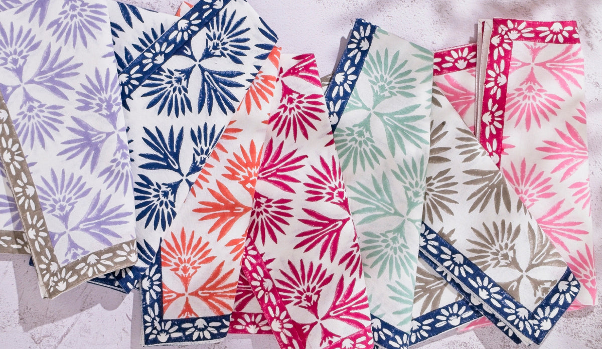 Set of colorful patterned napkins on a white background